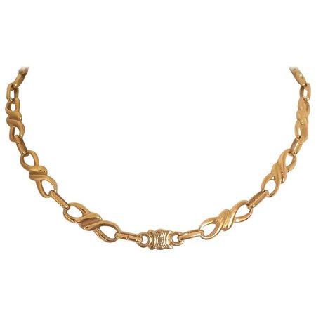 MINT. Vintage Celine golden twisted chain necklace with blaison macadam charm For Sale at 1stdibs