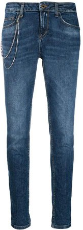 chain skinny tapered jeans