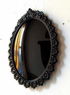 Black Convex Scrying Mirror in Vintage Oval Frame