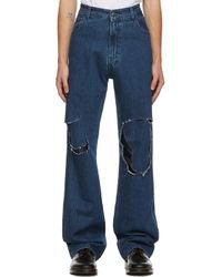 Raf Simons Denim Uneven Knee Patch Jeans in Navy (Blue) for Men - Lyst