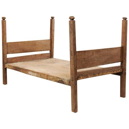 A Charmingly Bucolic Vintage Brazilian Cowhide and Wood Frame Single Size Day Bed For Sale at 1stDibs