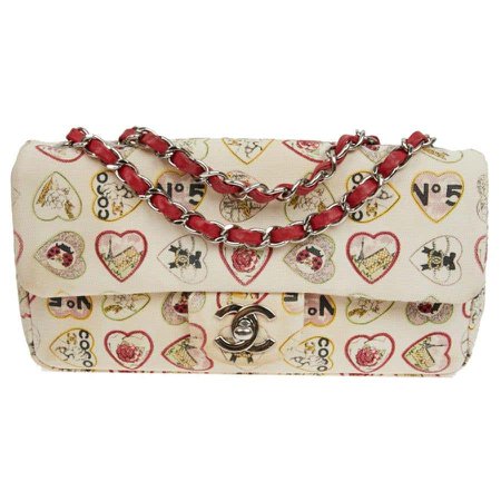 Collector CHANEL Vintage Timeless Coco Flap Bag in Beige Canvas For Sale at 1stDibs
