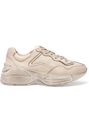 Gucci | Rhyton distressed leather sneakers | NET-A-PORTER.COM