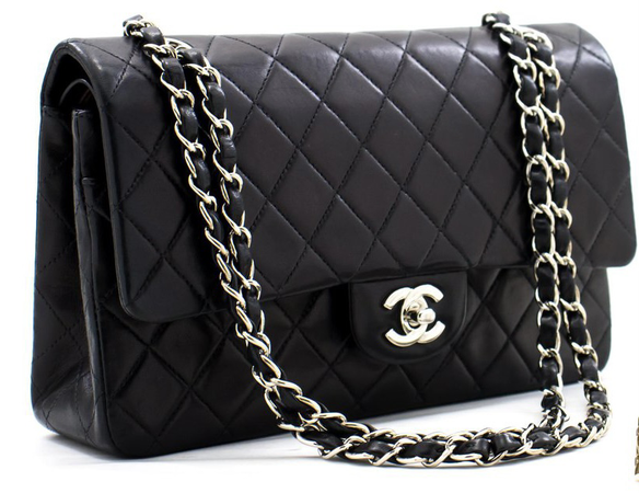 black and silver Chanel cross over bag