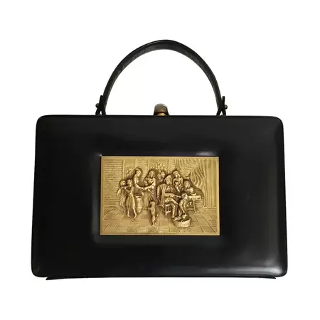 Prestige 60s brass relief black leather handbag. at 1stDibs
