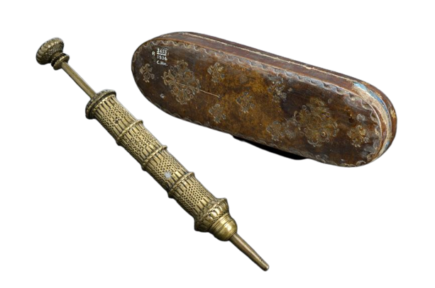Brass syringe, in case, French, early 17th century