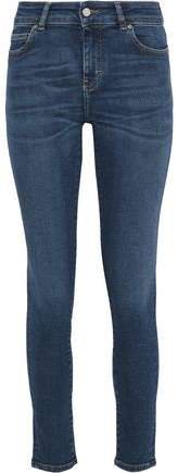 Distressed Mid-rise Skinny Jeans