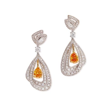 Pair of Fancy Vivid Yellow Orange Diamond and Diamond Pendent Earrings | 0.50及0.51克拉 艷彩黃橙色鑽石 配 鑽石 耳墜一對 | Magnificent Jewels: Part II | 2021 | Sotheby's
