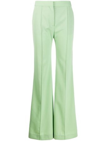 Shop green Victoria Victoria Beckham Victoria flared trousers with Express Delivery - Farfetch