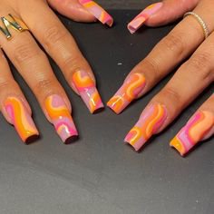 orange and pink abstract nails