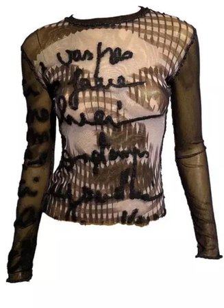 brown sheer top with writing