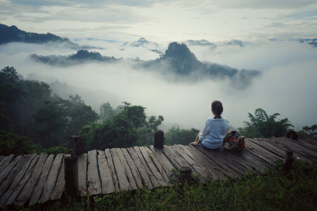 Free stock photo of Woman is looking the fog over mountain view of Mae Hong Son, Thailand. - Reshot