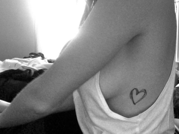 Heart rib tattoo | Tattoos | Small tattoo placement, Tasteful tattoos, Simple heart tattoos