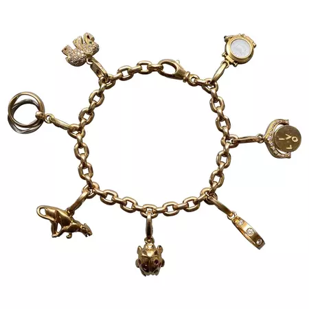 Gold and Diamond Cartier Charm Bracelet For Sale at 1stDibs