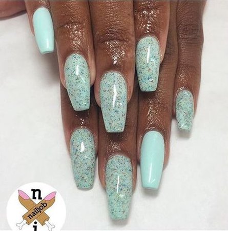 mint nails with black glitter speckles