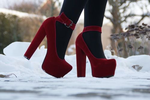 Red high heeled ankle boots