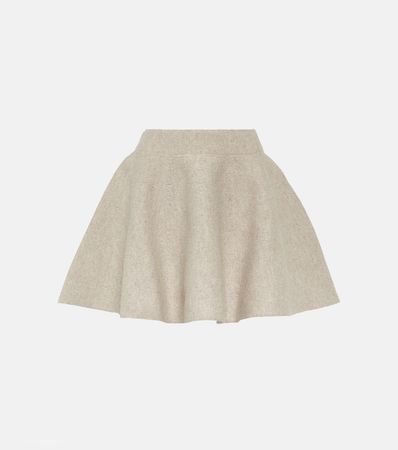 Flared Wool Blend Miniskirt in Beige - Alaia | Mytheresa