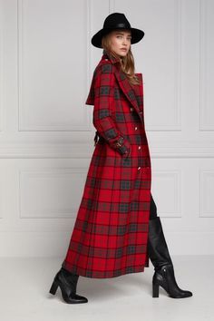 woman wearing red plaid trench coat - photo
