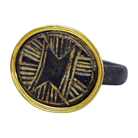 Ancient Roman Bronze Carved Signet Ring with 22 Karat Gold Bezel For Sale at 1stdibs
