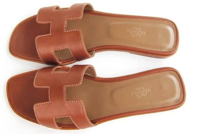 brown Hermès slippers