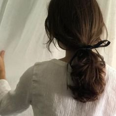 brown hair tied with black ribbon aesthetic