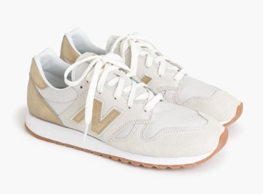 white and gold new balance sneakers