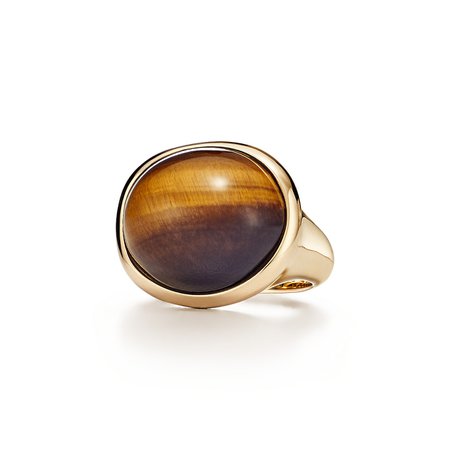 Elsa Peretti® Cabochon ring in 18k gold and tiger's eye, mini. | Tiffany & Co.