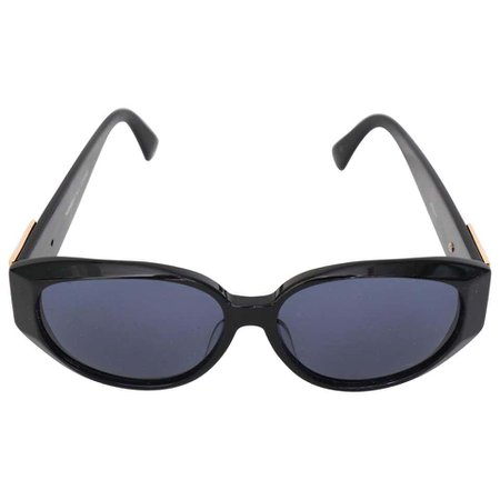 A Pair of 1980s Black Yves Saint Laurent Gold YSL Logo Detail Sunglasses For Sale at 1stdibs