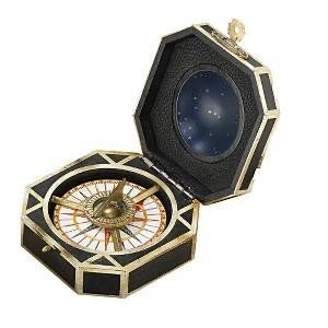 black and gold compass