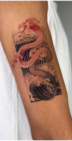 red and black dragon forearm tattoo