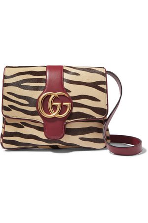 Gucci | Arli zebra-print calf hair and leather shoulder bag | NET-A-PORTER.COM