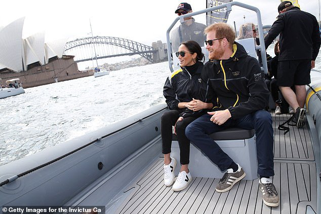 Prince Harry is lifted off his feet in hug by Invictus Games sailor | Daily Mail Online