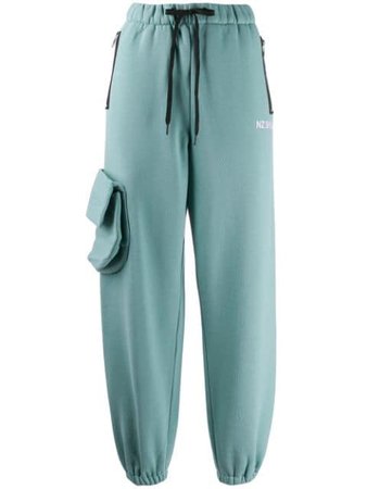 Shop green Natasha Zinko high-waisted track pants with Express Delivery - Farfetch