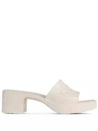 Shop Gucci logo embossed sandals with Express Delivery - FARFETCH