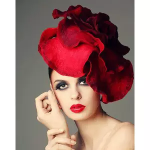 model with red flower hat