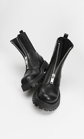 Flat ankle boots with track sole and zip - Women's Just in | Stradivarius United States BLACK