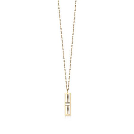 Tiffany T Two open vertical bar pendant in 18k gold with diamonds. | Tiffany & Co.