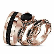 black and gold his and her wedding ring sets - Google Search