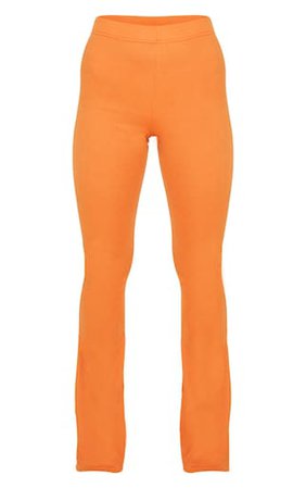 Burnt Orange Ribbed Flared Trousers | PrettyLittleThing