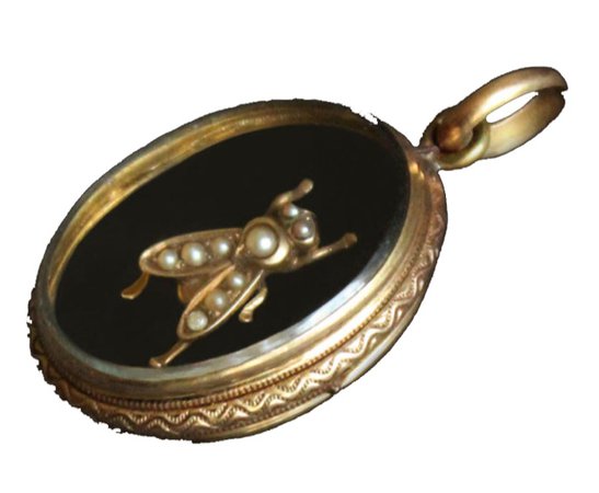 golden fly pendant