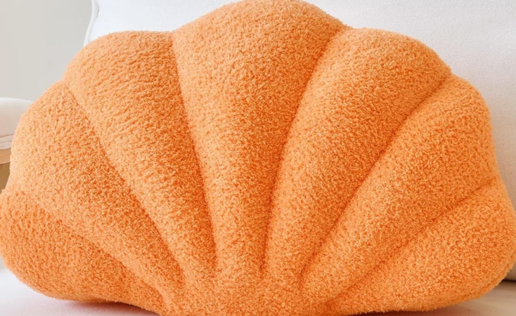 orange seashell pillow