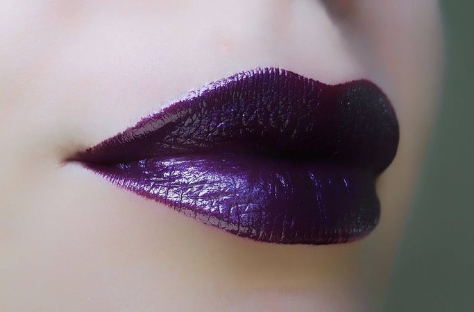 Dark purple creamy lipstick