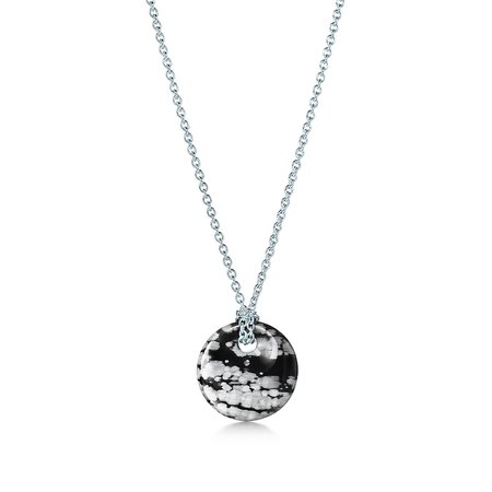 Elsa Peretti® Round pendant of snowflake obsidian and sterling silver. | Tiffany & Co.