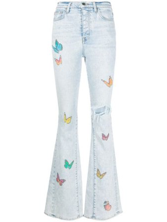 Shop blue AMIRI butterfly-print ripped jeans with Express Delivery - Farfetch