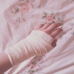 bandaged hands aesthetic