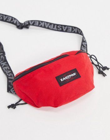 Eastpak Springer fanny pack with tape strap in red 2l | ASOS