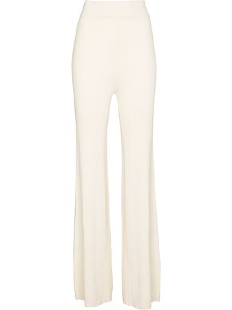 REMAIN Solaima Flared Knitted Trousers - Farfetch