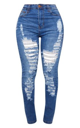 Shape Mid Wash Extreme Rib Skinny Jeans | PrettyLittleThing