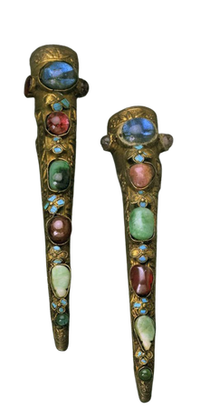 Jewel encrusted nail covers, mid to late 1800s, China. [Owned by the wealthy, displaying that no physical labor was done by the wearer.]