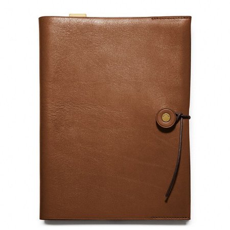 brown leather bound notebook